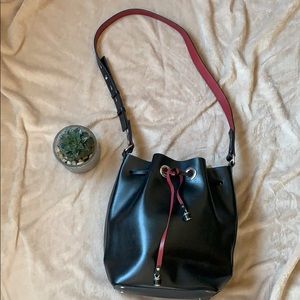 Zara vegan leather bucket bag with red lining